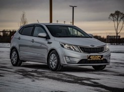 Kia Rio 2013 г. (серебряный)